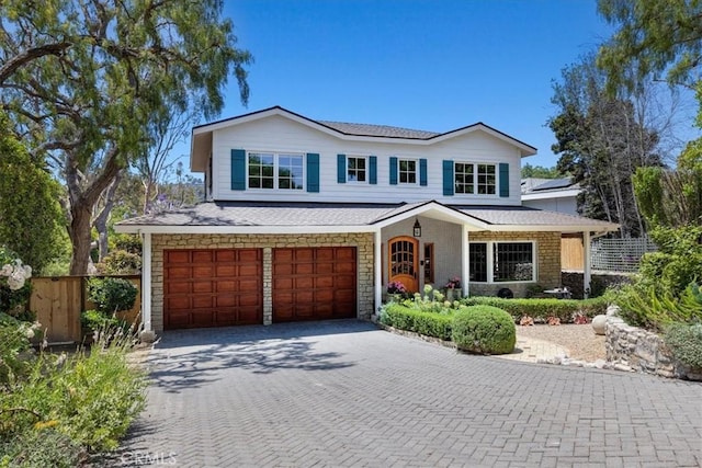 79 Dapplegray Ln, Rolling Hills Estates, CA 90274 - traditional-style home featuring an attached garage, decorative driveway, and roof with shingles