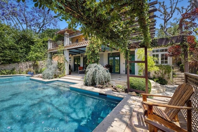79 Dapplegray Ln, Rolling Hills Estates, CA 90274 - rear view of house with french doors and a patio