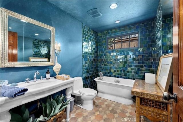 79 Dapplegray Ln, Rolling Hills Estates, CA 90274 - bathroom featuring a freestanding bath, tile walls, and vanity