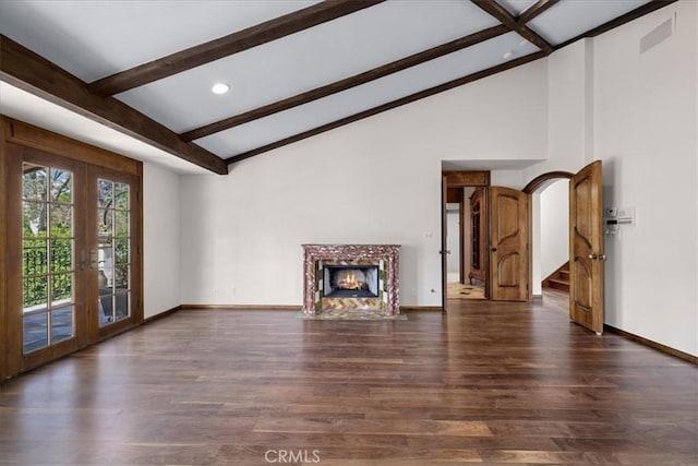 79 Dapplegray Ln, Rolling Hills Estates, CA 90274 - unfurnished living room featuring french doors, wood finished floors, beamed ceiling, a high end fireplace, and stairs
