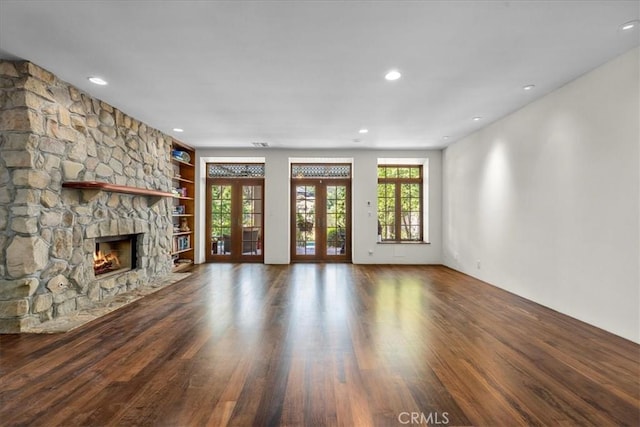 79 Dapplegray Ln, Rolling Hills Estates, CA 90274 - unfurnished living room with wood finished floors, a fireplace, recessed lighting, and french doors