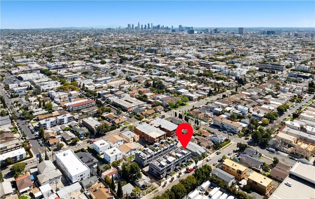 922 N Ridgewood Pl, Los Angeles, CA 90038 - aerial view of property and surrounding area featuring nearby urban area