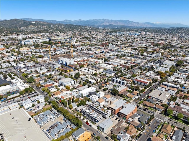 922 N Ridgewood Pl, Los Angeles, CA 90038 - aerial view of property and surrounding area featuring a mountainous background