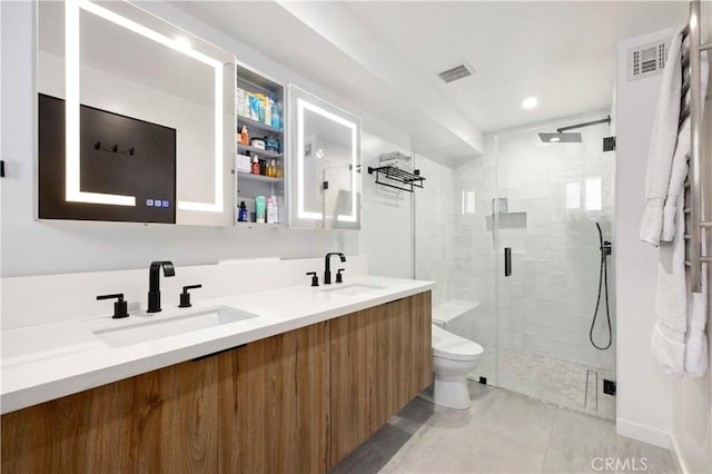 922 N Ridgewood Pl, Los Angeles, CA 90038 - full bathroom featuring double vanity, tile patterned flooring, a shower stall, and recessed lighting