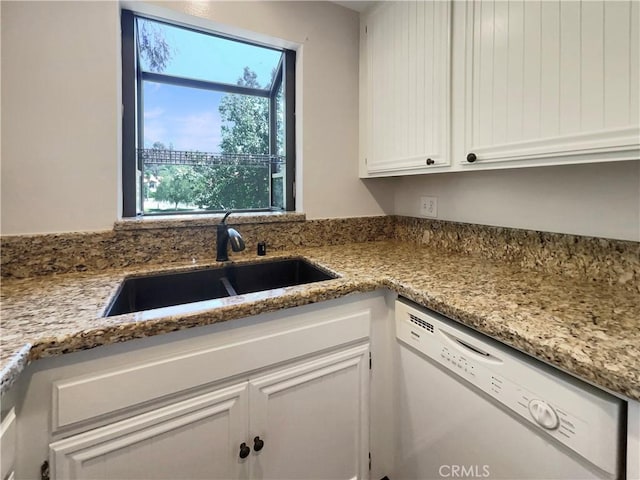 28021 Sarabande Ln Unit 1209, Canyon Country, CA 91387 - kitchen with dishwasher, white cabinets, and light stone countertops