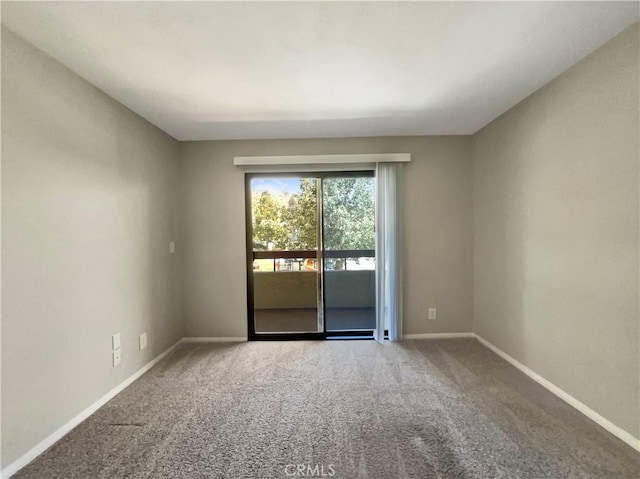 28021 Sarabande Ln Unit 1209, Canyon Country, CA 91387 - carpeted empty room featuring baseboards