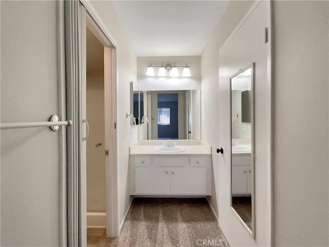28021 Sarabande Ln Unit 1209, Canyon Country, CA 91387 - bathroom with vanity and baseboards