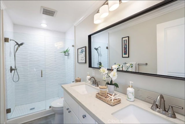 2358 Via Mariposa E Unit B, Laguna Woods, CA 92637 - full bath featuring a stall shower, double vanity, and crown molding