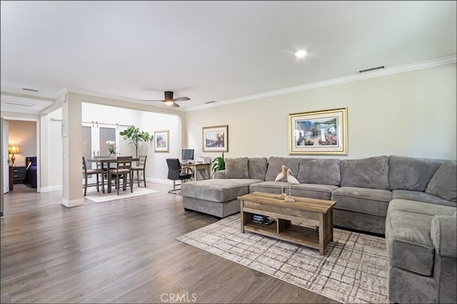 2358 Via Mariposa E Unit B, Laguna Woods, CA 92637 - living area with a ceiling fan, wood finished floors, and crown molding