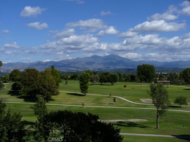 2358 Via Mariposa E Unit B, Laguna Woods, CA 92637 - view of property's community featuring a mountain view, view of golf course, and a yard