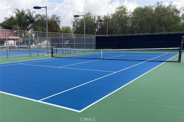 2358 Via Mariposa E Unit B, Laguna Woods, CA 92637 - view of tennis court with community basketball court