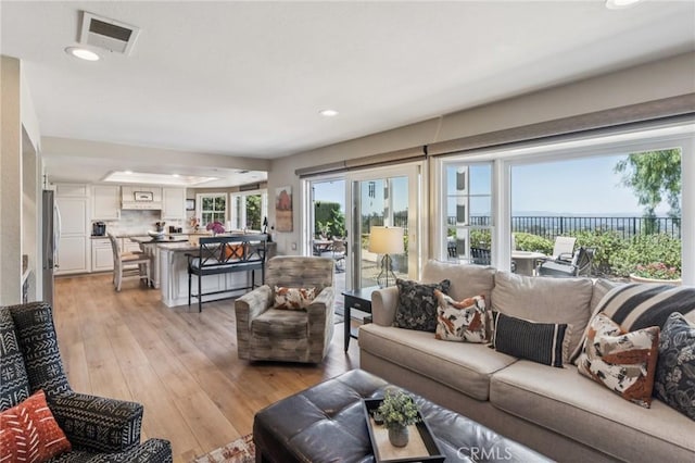 27201 Via Aurora, Mission Viejo, CA 92691 - living area featuring light wood-style floors and recessed lighting