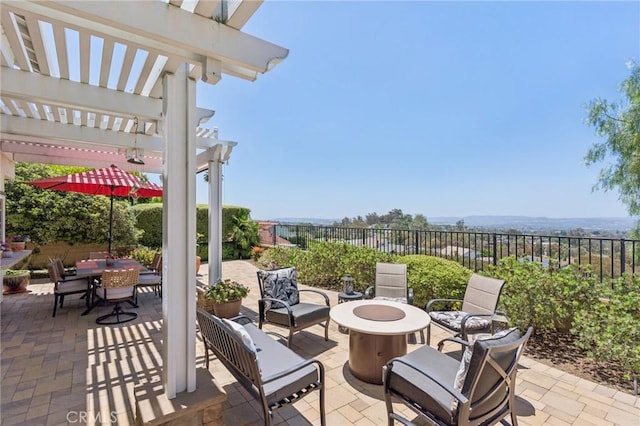27201 Via Aurora, Mission Viejo, CA 92691 - fenced backyard with an outdoor fire pit, a pergola, a patio area, and outdoor dining area