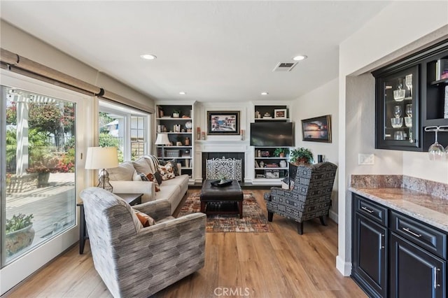 27201 Via Aurora, Mission Viejo, CA 92691 - living area with light wood-style flooring and recessed lighting