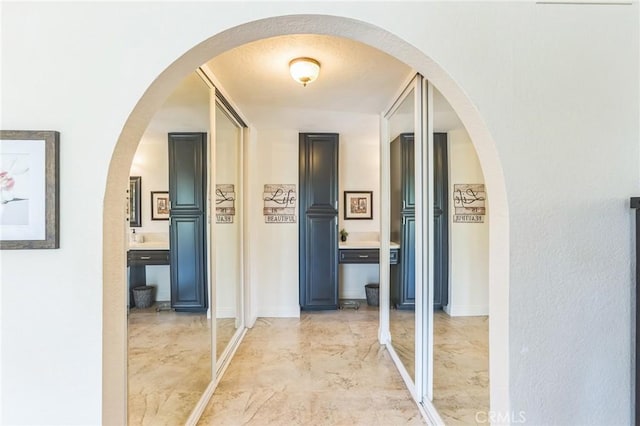 27201 Via Aurora, Mission Viejo, CA 92691 - hallway featuring light marble finish floors