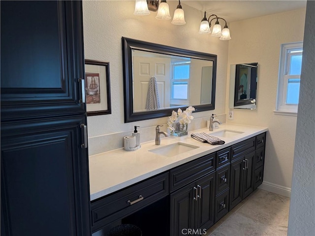 27201 Via Aurora, Mission Viejo, CA 92691 - bathroom with double vanity, plenty of natural light, and tile patterned flooring