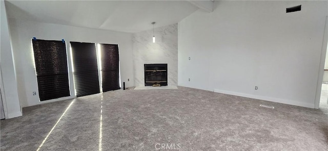 818 60th St W, Rosamond, CA 93560 - unfurnished living room with carpet floors and a premium fireplace