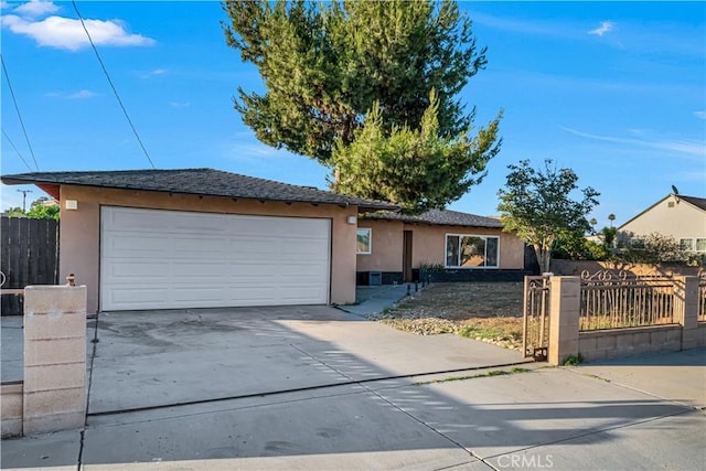 17790 Merrill Ave, Fontana, CA 92335 - ranch-style house featuring stucco siding, driveway, and an attached garage