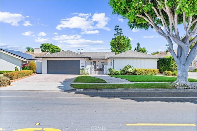 1915 Mariners Dr, Newport Beach, CA 92660 - single story home with an attached garage, concrete driveway, and a gate