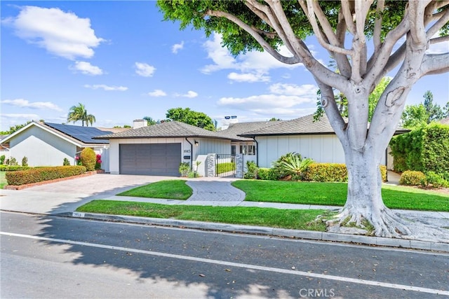 1915 Mariners Dr, Newport Beach, CA 92660 - view of front facade with a garage, concrete driveway, roof with shingles, and a gate
