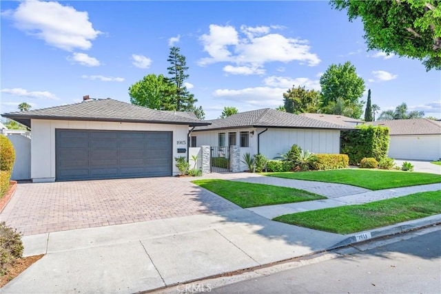 1915 Mariners Dr, Newport Beach, CA 92660 - single story home featuring decorative driveway, a garage, and a gate