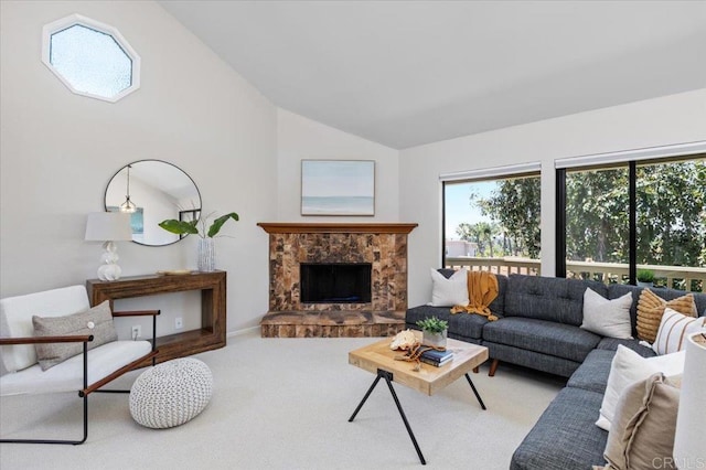 6684 Corte Maria, Carlsbad, CA 92009 - carpeted living area featuring vaulted ceiling and a stone fireplace
