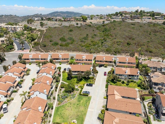 6684 Corte Maria, Carlsbad, CA 92009 - aerial view of property's location featuring nearby suburban area and a mountainous background