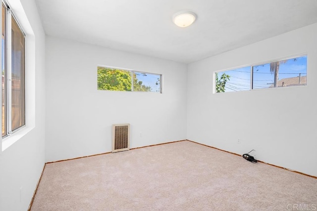 855 Quail St, San Diego, CA 92102 - empty room featuring healthy amount of natural light and carpet