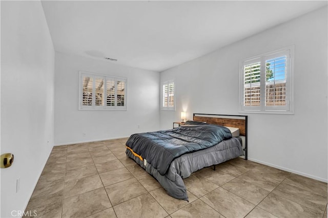 43627 Rialto Dr, Lancaster, CA 93535 - tiled bedroom with multiple windows