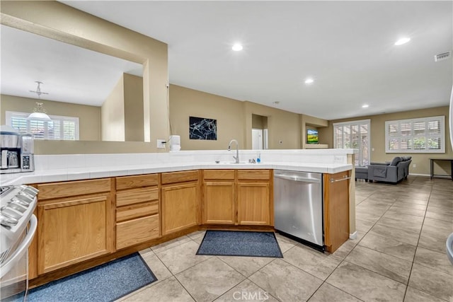 43627 Rialto Dr, Lancaster, CA 93535 - kitchen with stainless steel appliances, open floor plan, healthy amount of natural light, recessed lighting, and light tile patterned flooring