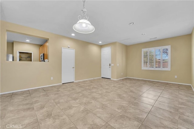 43627 Rialto Dr, Lancaster, CA 93535 - tiled empty room with baseboards and recessed lighting