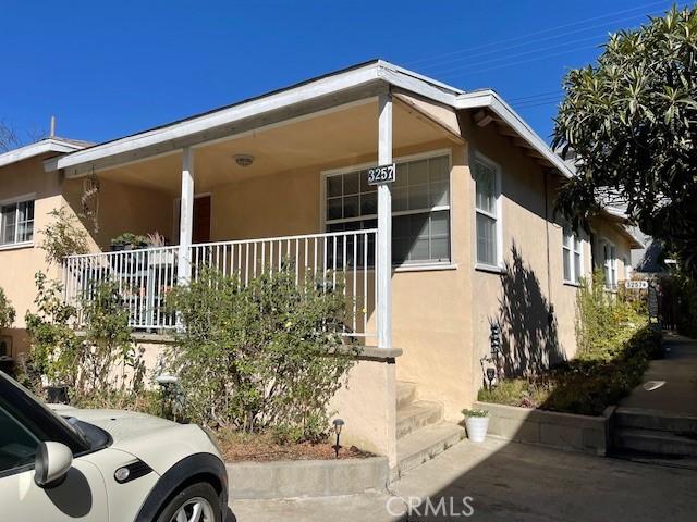 3257 Honolulu Ave, Glendale, CA 91214 - view of home's exterior with stucco siding and covered porch