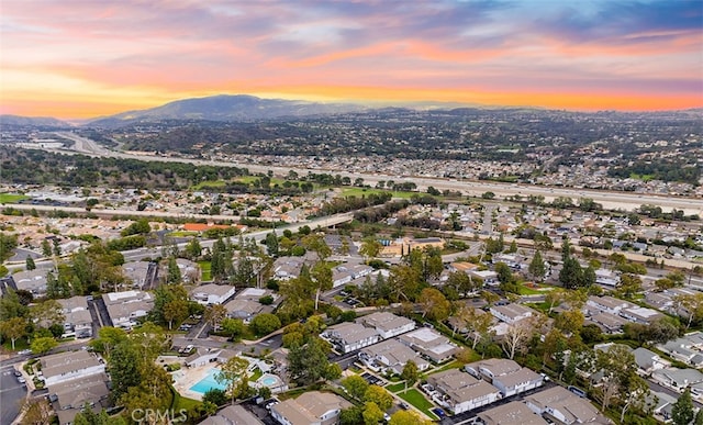 6567 Woodburn Ln Unit 7, Yorba Linda, CA 92886 - aerial view of property and surrounding area featuring mountains and nearby suburban area