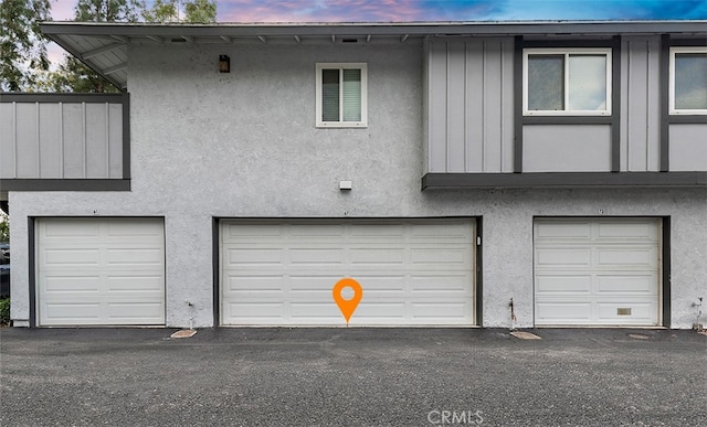 6567 Woodburn Ln Unit 7, Yorba Linda, CA 92886 - view of garage at dusk