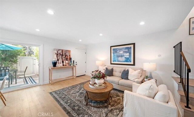 6567 Woodburn Ln Unit 7, Yorba Linda, CA 92886 - living room featuring light wood finished floors, recessed lighting, and stairs