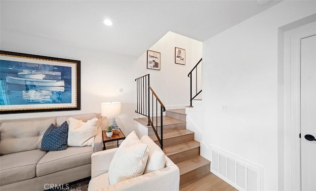 6567 Woodburn Ln Unit 7, Yorba Linda, CA 92886 - living area featuring light wood finished floors, stairs, and recessed lighting