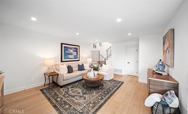 6567 Woodburn Ln Unit 7, Yorba Linda, CA 92886 - living area with stairs, light wood-style floors, and recessed lighting