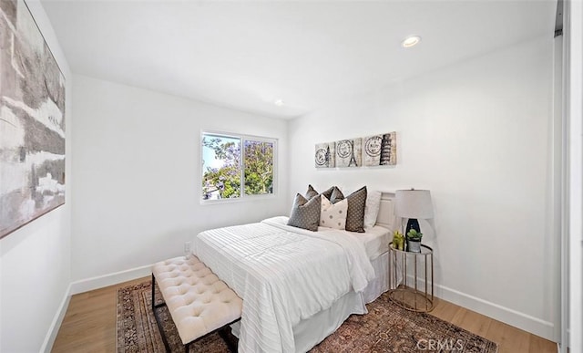 6567 Woodburn Ln Unit 7, Yorba Linda, CA 92886 - bedroom featuring wood finished floors and recessed lighting