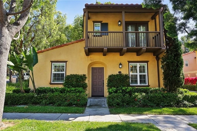 78 Windchime, Irvine, CA 92603 - mediterranean / spanish house with a balcony and stucco siding
