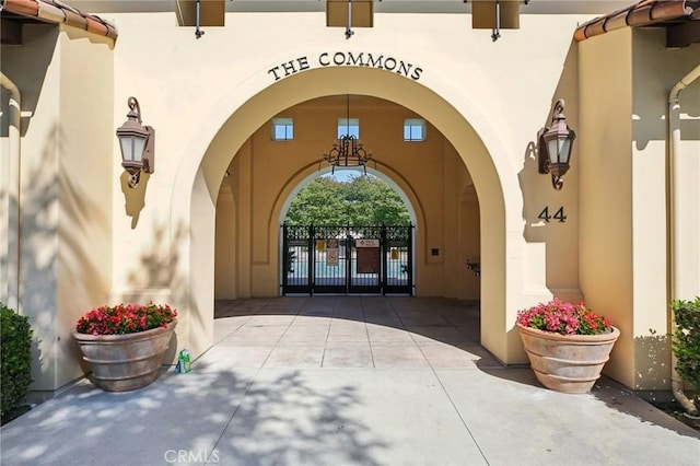78 Windchime, Irvine, CA 92603 - property entrance featuring stucco siding