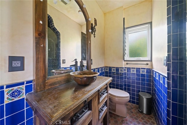 1409 Laveta, Los Angeles, CA 90026 - bathroom featuring tile walls, vanity, wainscoting, and tile patterned flooring