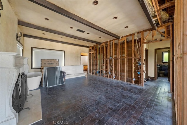 1409 Laveta, Los Angeles, CA 90026 - unfurnished living room with beam ceiling, wood finished floors, and recessed lighting