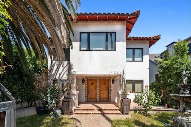 1409 Laveta, Los Angeles, CA 90026 - mediterranean / spanish-style home with a tile roof and stucco siding