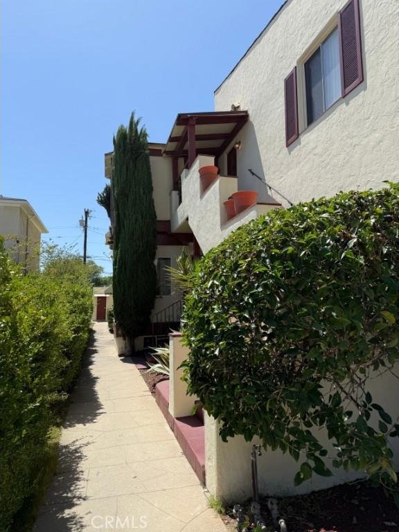 1237 S 3rd St, Alhambra, CA 91801 - view of side of property with stucco siding