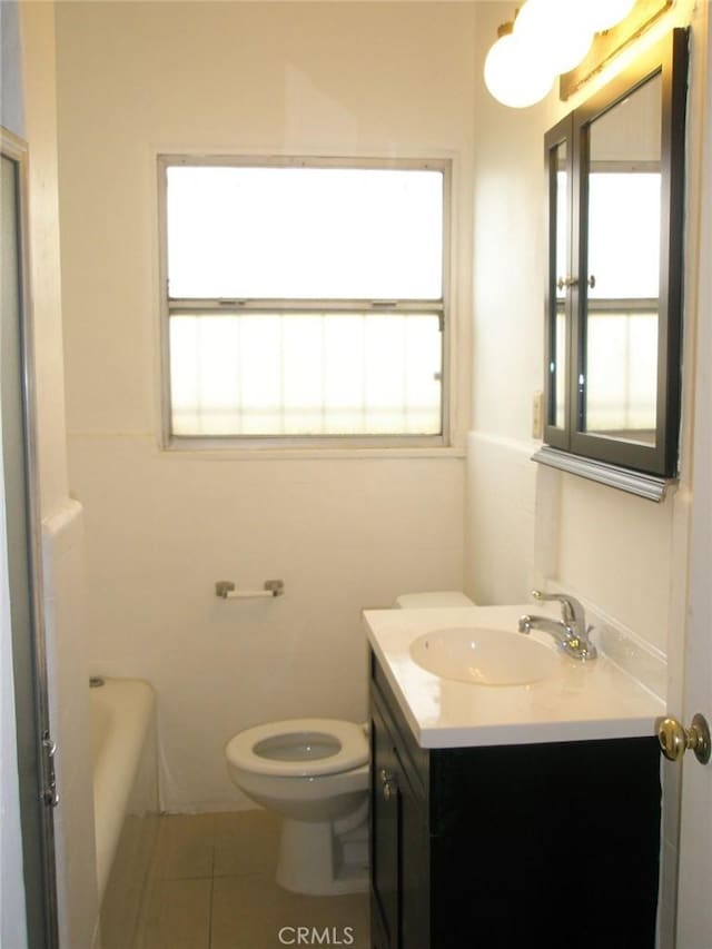 1237 S 3rd St, Alhambra, CA 91801 - bathroom with plenty of natural light, vanity, a tub to relax in, and tile patterned floors