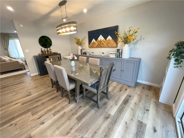 9749 Reseda Blvd Unit 13, Northridge, CA 91324 - dining area with light wood-style floors and recessed lighting