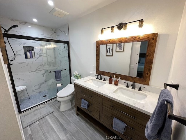9749 Reseda Blvd Unit 13, Northridge, CA 91324 - full bathroom featuring a marble finish shower and double vanity