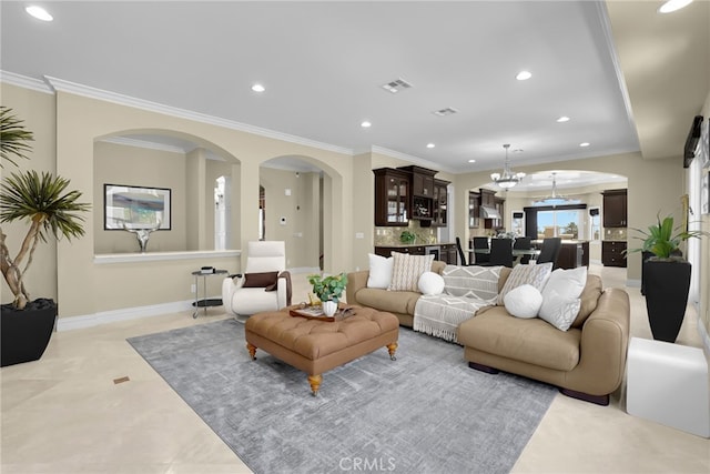 15841 Aurora Crest Dr, Whittier, CA 90605 - living area with arched walkways, recessed lighting, ornamental molding, and a chandelier