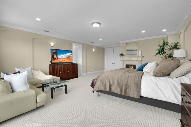 15841 Aurora Crest Dr, Whittier, CA 90605 - bedroom featuring crown molding, recessed lighting, a lit fireplace, carpet floors, and a closet