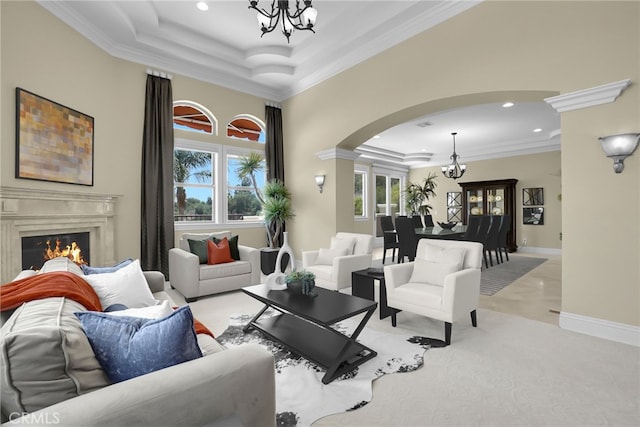 15841 Aurora Crest Dr, Whittier, CA 90605 - living area featuring a chandelier, arched walkways, crown molding, recessed lighting, and a fireplace